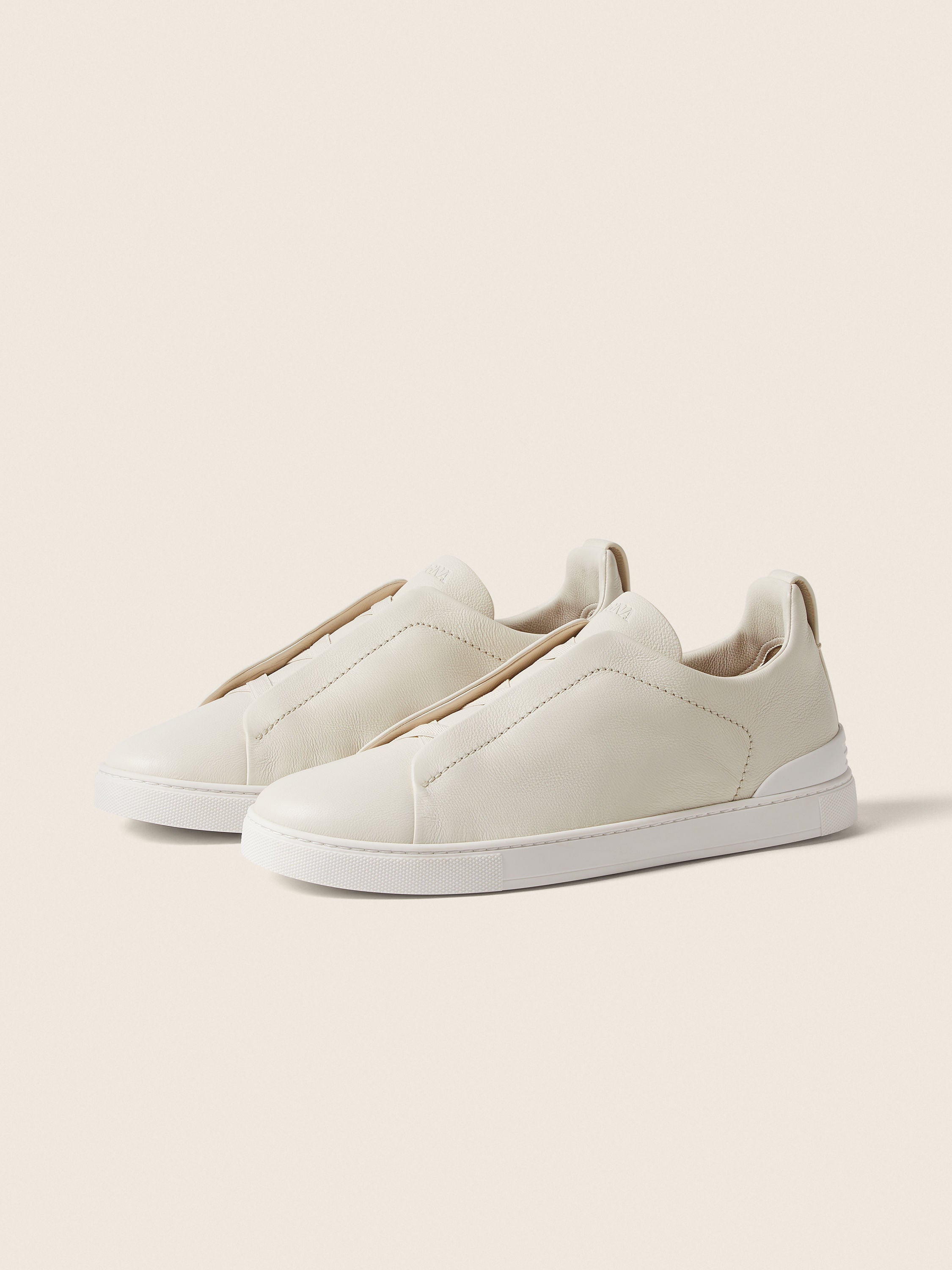 Triple Stitch SECONDSKIN Slip-On Sneakers – White | Asterley Court